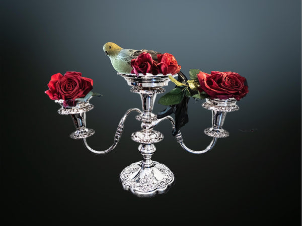 Silverplate epergne with parakeet and roses