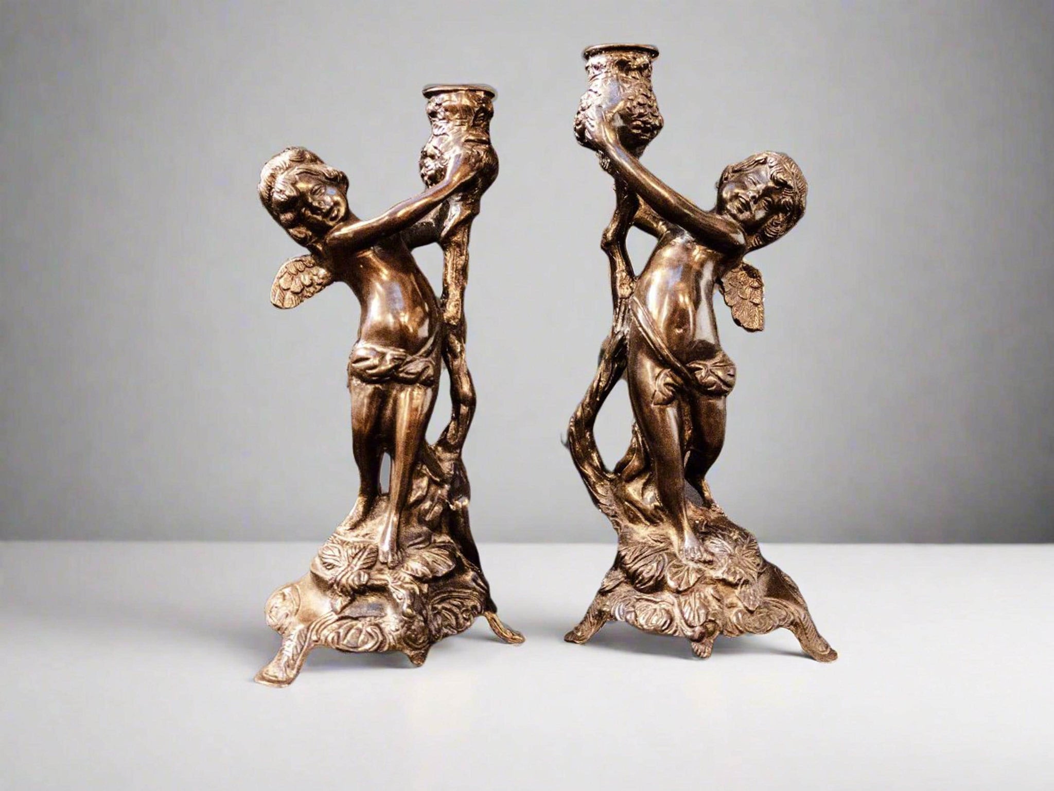 Set Of two French brass cherub putti 2024 candle holders